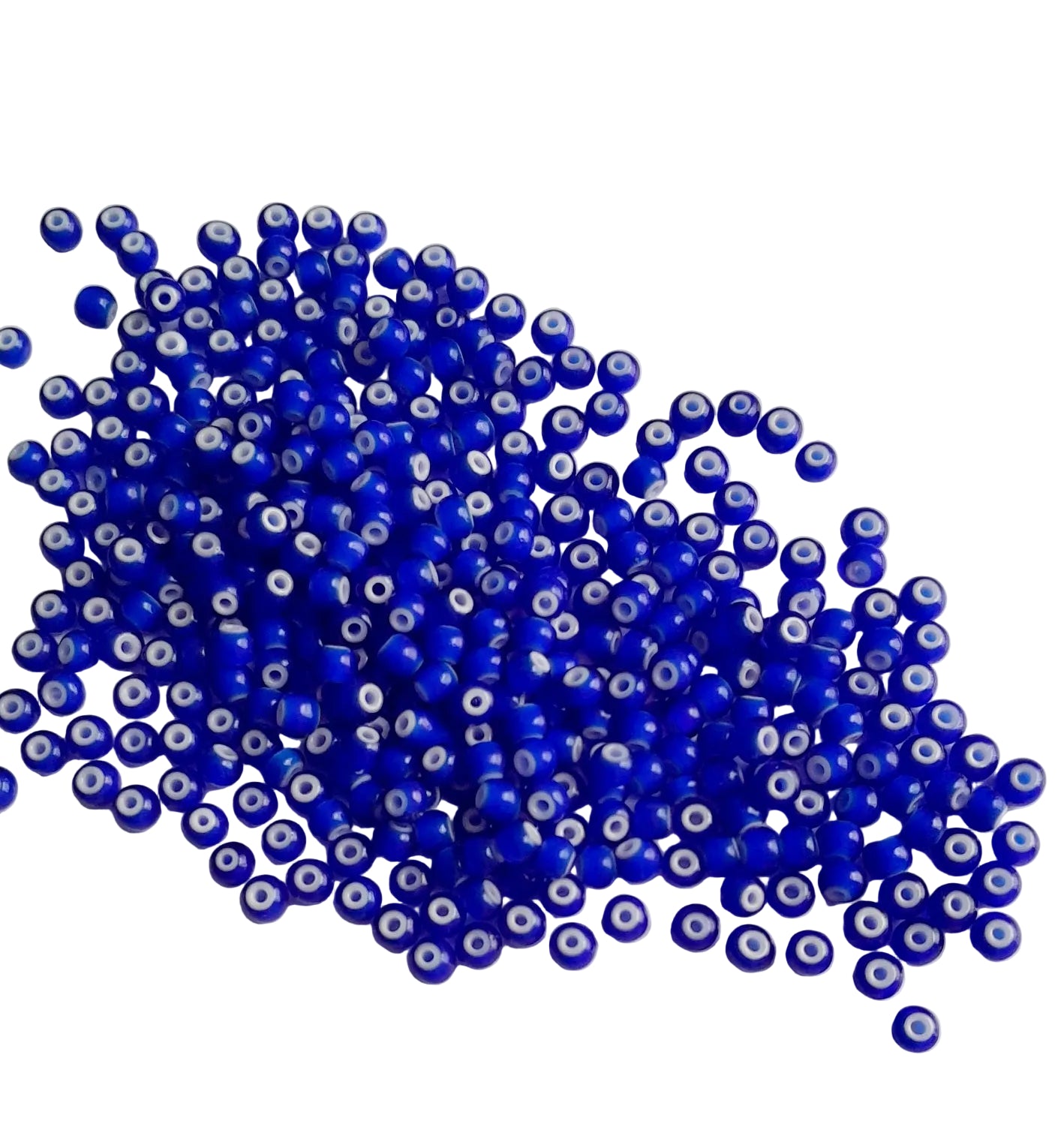 Pile of blue beads with white eyes on a light gray background