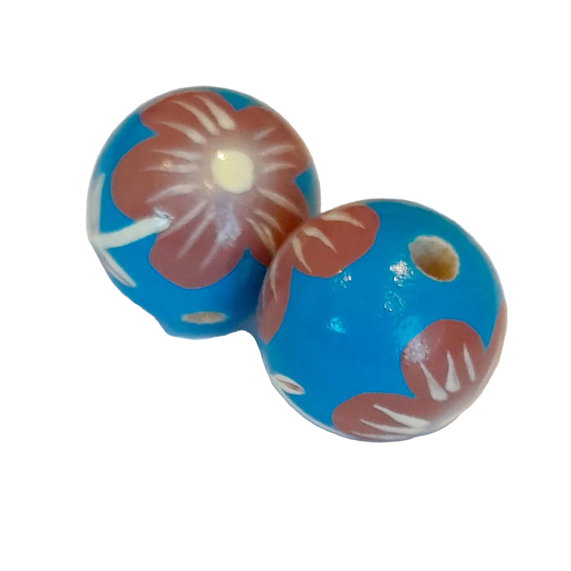 Two round blue wooden beads with a brown floral pattern and white details,