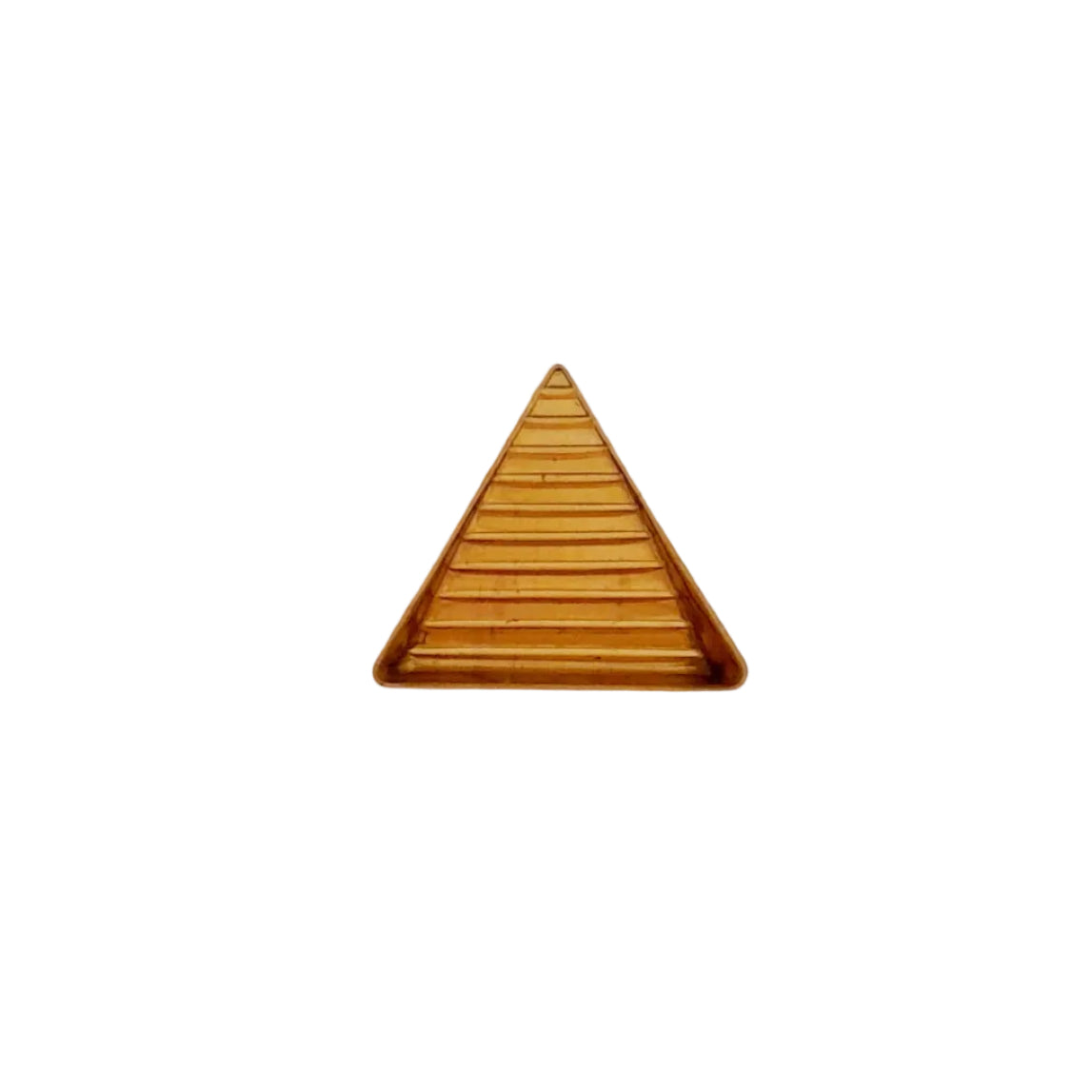 A small triangular brass element with horizontal ridges,
