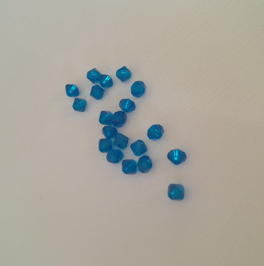 4mm small, facetedbicone blue capri crystal beads by swarovski