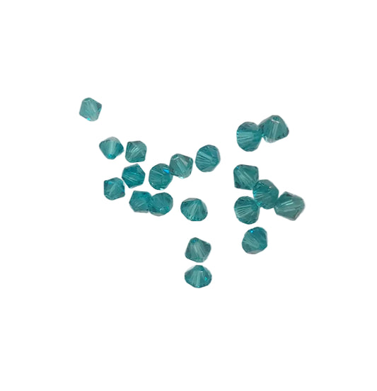 4mm small, faceted teal-blue swarovski beads transparent