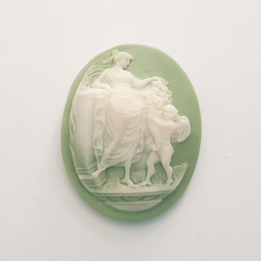 Cameo Plastic Oval 48x37mm Woman with Cherub Green and Ivory