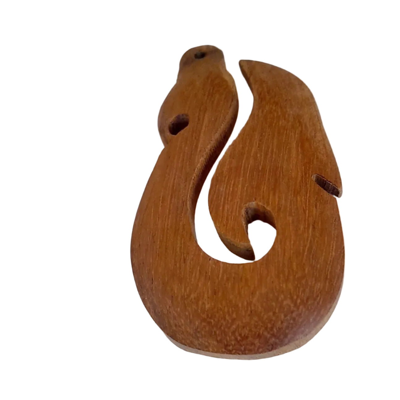 A carved wooden pendant or ornament shaped like a stylized fish or hook, made from medium brown wood with visible grain, 