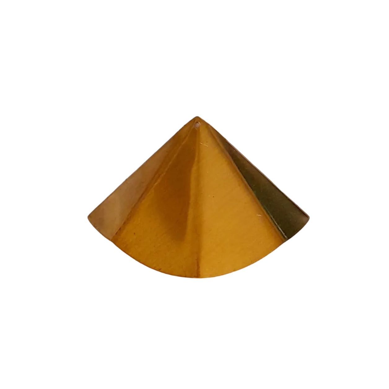 A small metallic gold pyramid-shaped object, 