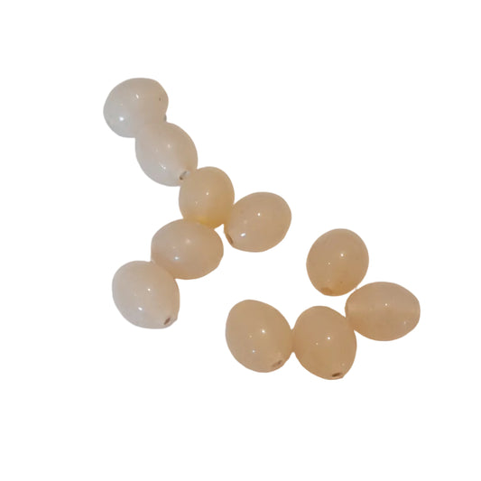 pale peach-beige oval beads with small holes, 
