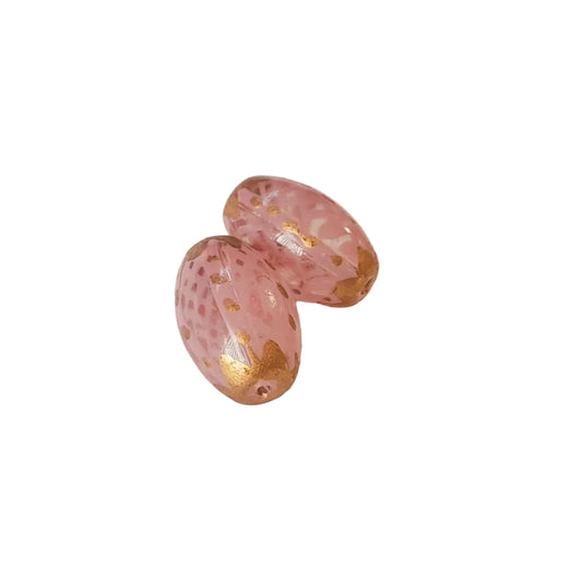 Two oval pink glass beads with gold foil accents and speckled detailing, indian glass 