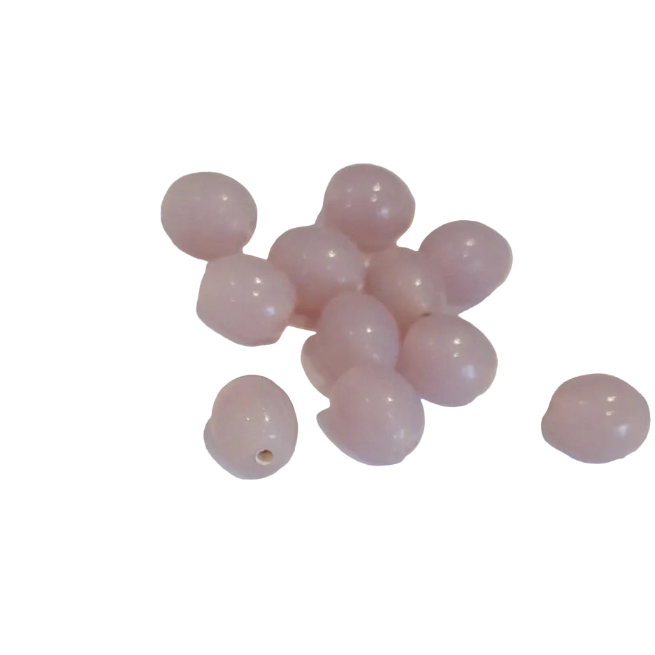 small, smooth, oval-shaped beads in a soft dusty lilac indian glass