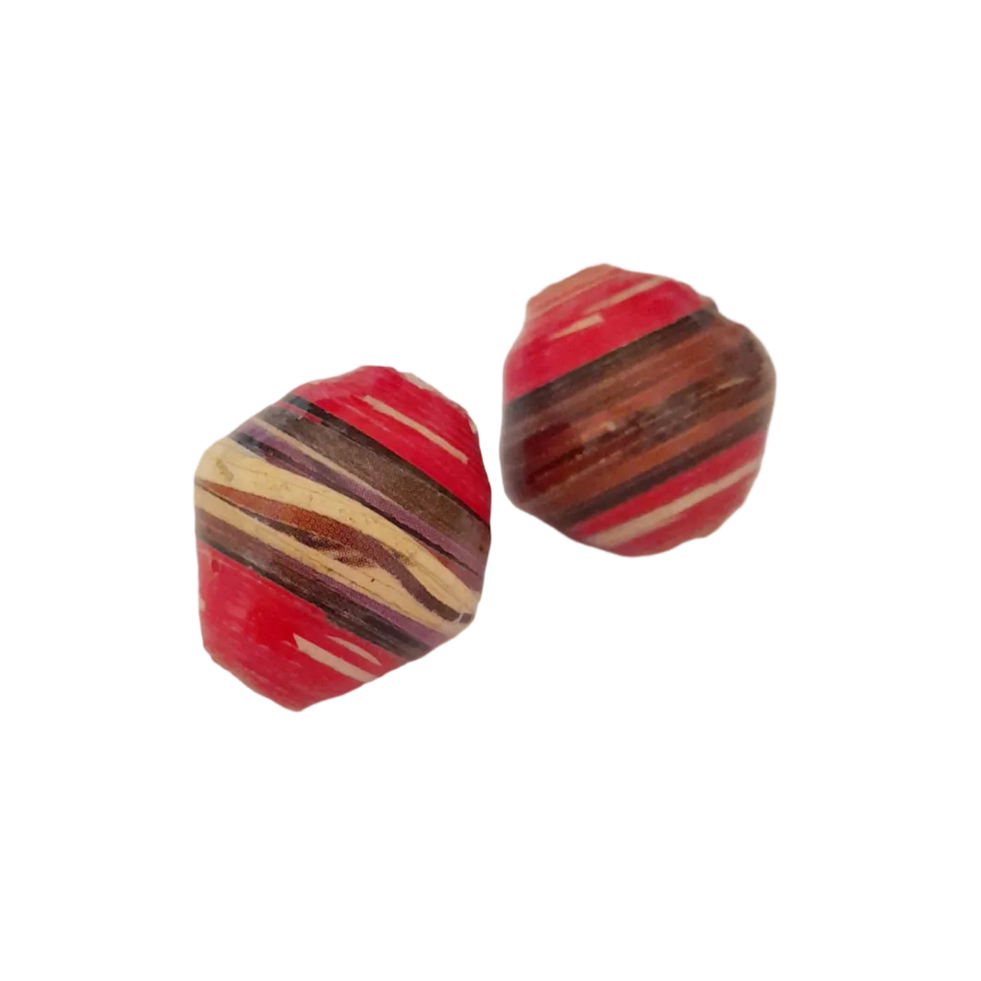 Two handmade paper beads with striped patterns of red, brown, beige, and white, 