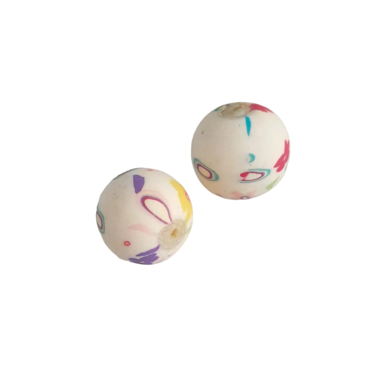 Two round white beads with colorful abstract patterns, polymer baby blessing bead