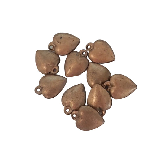 small, antique bronze heart-shaped jewelry charms with attached loops, 