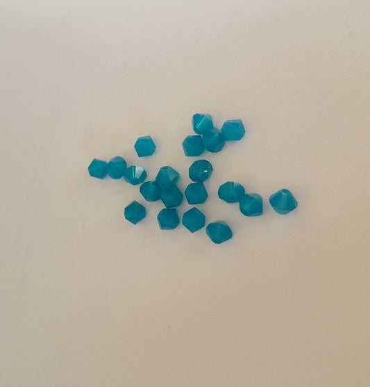 A small 4mm faceted teal-blue carabbean opal beads swarovski