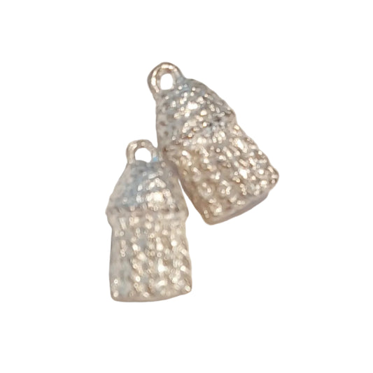 Two small silver-toned textured  solid tassel charms with loop tops, 
