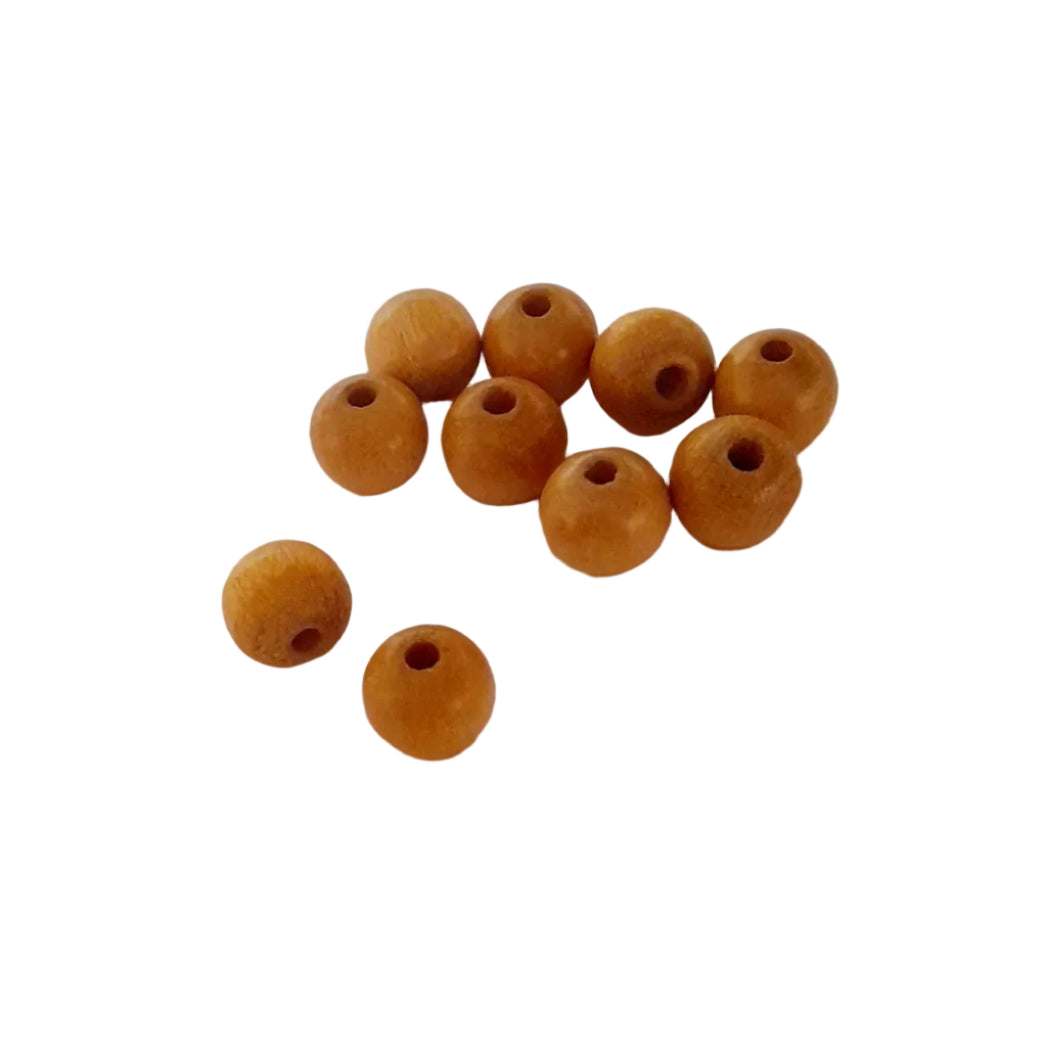 Ten small round wooden beads with drilled holes, 