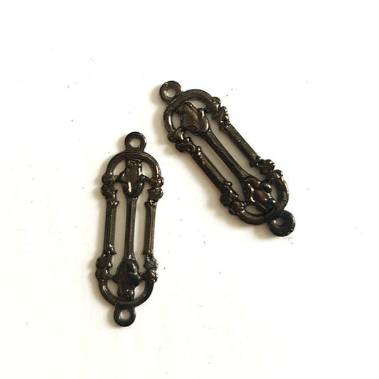 Two black plated brass rectangular connectors with intricate designs, likely intended for use in jewelry making.