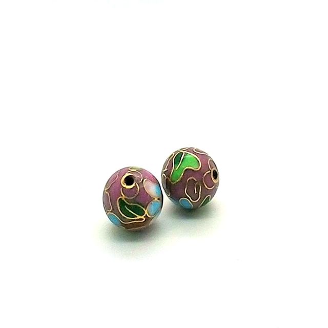 Two round cloisonne metal beads with a floral pattern in muted purple and green colors, separated by a small metallic bead ring.
